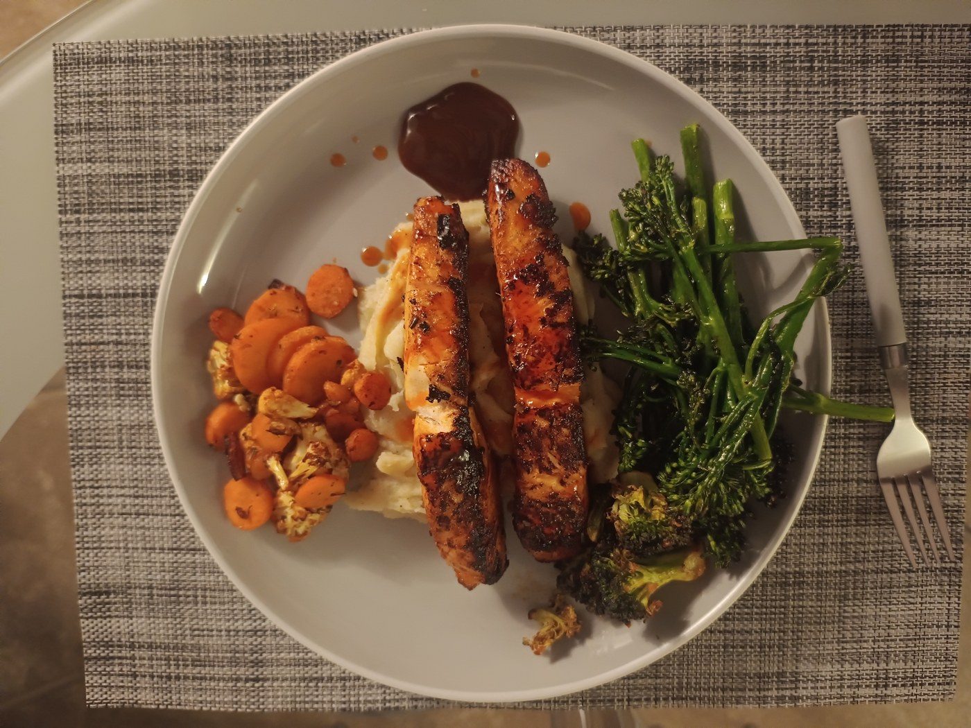 Glazed salmon with mash and tenderstem